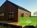 Nowoczesny dom 70m2 bez pozwolenia, z drewnianą elewacją i tarasem, gotowy do zamieszkania.