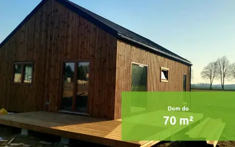 Nowoczesny dom 70m2 bez pozwolenia, z drewnianą elewacją i tarasem, gotowy do zamieszkania.